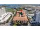 Aerial view showcases a condominium complex with amenities and proximity to the airport and bay at 100 4Th S Ave # 207, St Petersburg, FL 33701