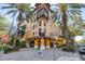 Beautiful building featuring a stylish corner view surrounded by palm trees at 100 4Th S Ave # 207, St Petersburg, FL 33701