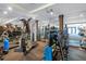 Fully equipped gym featuring weightlifting stations, cardio machines, and ample space at 100 4Th S Ave # 207, St Petersburg, FL 33701