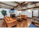 Cozy community living room with comfortable seating, hardwood floors, and a fireplace for relaxing at 100 4Th S Ave # 207, St Petersburg, FL 33701