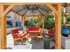 Cozy outdoor seating area under a gazebo, offering a comfortable and shaded space for relaxation and socializing at 100 4Th S Ave # 207, St Petersburg, FL 33701