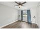 Simple bedroom with a window, light fixtures and plenty of natural light at 1000 8Th Sw Ave, Largo, FL 33770