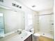 Bathroom featuring a vanity with a large mirror and a walk-in shower at 1001 Culbreath Green Ct, Ruskin, FL 33570