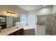 Bright bathroom featuring a soaking tub, walk-in shower, and dual vanity sinks at 10048 Cleghorn Dr, San Antonio, FL 33576