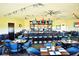 Dining room featuring a full bar and tables set for dining at 10048 Cleghorn Dr, San Antonio, FL 33576