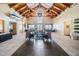 A spacious lobby with high vaulted ceilings, elegant furnishings, and natural light at 10048 Cleghorn Dr, San Antonio, FL 33576