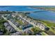 Beautiful aerial view of waterfront townhomes with stunning water and bridge views at 1010 Mango Ct, Oldsmar, FL 34677