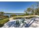 Waterfront view with outdoor chairs offering a serene spot to relax by the water at 1010 Mango Ct, Oldsmar, FL 34677