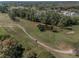 Scenic aerial view of the golf course, highlighting the manicured greens and fairways at 11719 Foxworth Ln, New Port Richey, FL 34654