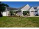 Attractive single-Gathering home with a well-maintained lawn, fenced yard, and a two-car garage at 12140 74Th St, Largo, FL 33773