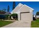 Well-maintained single Gathering home with a two-car garage, and freshly landscaped yard at 12140 74Th St, Largo, FL 33773
