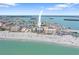 Aerial view of beachfront condominiums, perfect for beach lovers and vacationers alike at 12924 Gulf Blvd # 502, Madeira Beach, FL 33708