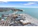 Gorgeous aerial view of the beach community with coastal access and stunning water views at 12924 Gulf Blvd # 502, Madeira Beach, FL 33708