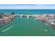 Spacious waterfront community featuring a bridge over clear blue waters and picturesque coastal views at 12924 Gulf Blvd # 502, Madeira Beach, FL 33708