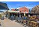 Outdoor restaurant, Bamboo Beach Bar & Grill, with rustic bar, outdoor seating, and lively atmosphere at 12924 Gulf Blvd # 502, Madeira Beach, FL 33708