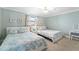 Charming bedroom featuring two beds, coastal decor, and a serene ambiance at 12924 Gulf Blvd # 502, Madeira Beach, FL 33708