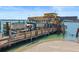 Beautiful dockside marina featuring a vibrant building, offering dolphin watching and fishing tours at 12924 Gulf Blvd # 502, Madeira Beach, FL 33708