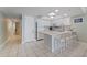 A well-equipped kitchen with a breakfast bar at 12924 Gulf Blvd # 502, Madeira Beach, FL 33708