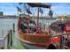 Unique pirate ship docked and ready for boarding, with plenty of space for passengers to relax and enjoy at 12924 Gulf Blvd # 502, Madeira Beach, FL 33708