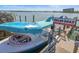 Fun shark-themed boat docked and ready for tours, featuring a unique design and waterfront views at 12924 Gulf Blvd # 502, Madeira Beach, FL 33708