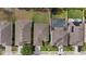 Overhead shot showing rooflines, landscaping, and backyard pools, providing a comprehensive view of the neighborhood at 12934 Tikal Way, Trinity, FL 34655