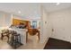Welcoming kitchen featuring an island, breakfast bar, and modern appliances at 12934 Tikal Way, Trinity, FL 34655