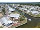 Waterfront property with canal access, landscaping, and outdoor decor in this charming residential community at 131 E Saint Annes Cir, Apollo Beach, FL 33572