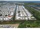 Aerial view of waterfront community with beautiful canal access at 131 E Saint Annes Cir, Apollo Beach, FL 33572