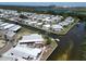 Waterfront community showcasing canal access and tropical landscaping at 131 E Saint Annes Cir, Apollo Beach, FL 33572