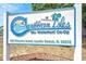 Community sign for Caribbean Isles, a 55+ waterfront co-op in Apollo Beach, FL at 131 E Saint Annes Cir, Apollo Beach, FL 33572