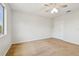 This bedroom has neutral carpet, a ceiling fan, and a double closet at 16323 Muirfield Dr, Odessa, FL 33556