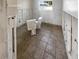 Bathroom featuring two toilets at 1715 Delaware Ne Ave, St Petersburg, FL 33703