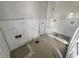 Bathroom featuring tiled shower at 1715 Delaware Ne Ave, St Petersburg, FL 33703
