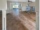 Spacious living room featuring tiled floors and sliding glass doors to the outdoor pool at 1715 Delaware Ne Ave, St Petersburg, FL 33703