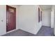 Inviting front entrance with a brick-paved porch and a stylish, modern door with glass pane at 17214 Star Banks St, Wimauma, FL 33598
