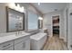 Modern bathroom features a soaking tub, double vanity, and walk-in closet at 19611 Cypress Bridge Dr, Odessa, FL 33556