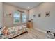 Bright bedroom featuring a natural light and playful decor at 19611 Cypress Bridge Dr, Odessa, FL 33556