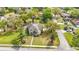 This residence features manicured grounds, mature trees, and convenient street access at 22119 Weeks Blvd, Land O Lakes, FL 34639