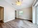 Bedroom featuring sliding doors to an outdoor patio at 22119 Weeks Blvd, Land O Lakes, FL 34639