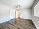 Bedroom includes a closet, window and new flooring at 22119 Weeks Blvd, Land O Lakes, FL 34639