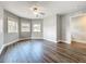 Spacious bedroom showing hard flooring, ceiling fan and lots of light at 22119 Weeks Blvd, Land O Lakes, FL 34639