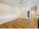 Bedroom featuring wood floors, ceiling fan, and closet at 22119 Weeks Blvd, Land O Lakes, FL 34639