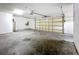 Clean garage space, featuring ample storage and a white interior at 22119 Weeks Blvd, Land O Lakes, FL 34639