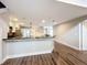 Open kitchen design with a wide breakfast bar and modern appliances, great for casual dining and entertaining at 22119 Weeks Blvd, Land O Lakes, FL 34639