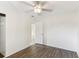 Comfortable bedroom featuring hard surface floors and a ceiling fan at 230 Davison Ne Ave, St Petersburg, FL 33703