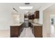 Stylish kitchen showcasing granite countertops, stainless steel appliances, and tiled flooring at 230 Davison Ne Ave, St Petersburg, FL 33703