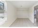 Bright and airy room with tile floors and a window to the backyard at 230 Davison Ne Ave, St Petersburg, FL 33703
