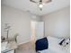 Bright bedroom with a ceiling fan, providing a comfortable and well-lit space at 2934 Living Coral Dr, Odessa, FL 33556