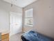 Bedroom featuring natural light, neutral walls, and soft carpet at 2934 Living Coral Dr, Odessa, FL 33556