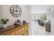 Open-concept living area flows into dining room and features modern décor and ample natural light at 2934 Living Coral Dr, Odessa, FL 33556